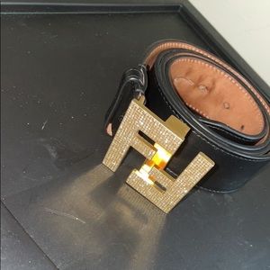 All black fendi belt with gold buckle about 2 yrs old